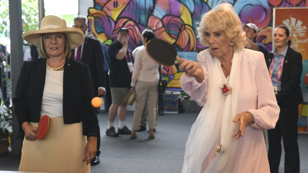 Camilla plays table tennis with Lucy Turnbull during a visit to the athletes' village at the Commonwealth Games on Thursday.