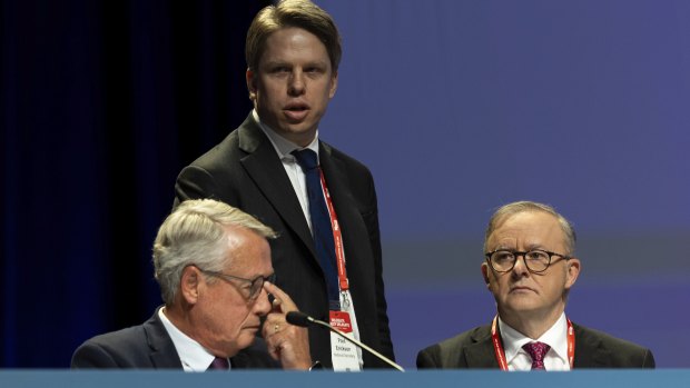 The man with tough advice: ALP national secretary Paul Erickson, standing, with Prime Minister Anthony Albanese and Labor’s national president Wayne Swan at the party’s national conference in  August. 