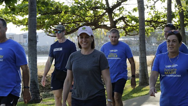 LNP leader Deb Frecklington walks along The Strand in Townsville on Friday morning.