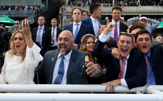 Champagne finish: Racegoers were in fine form on Everest day.