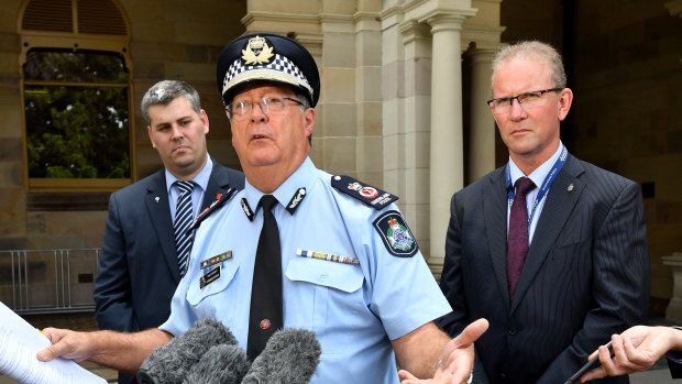 Queensland Police Commissioner Ian Stewart with Police Minister Mark Ryan and Queensland Police Union president Ian Leavers on Thursday.