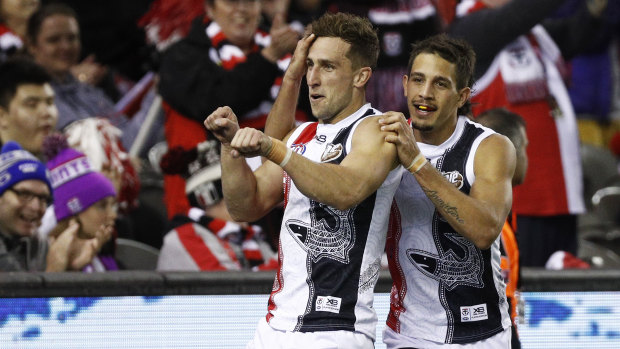 Big hit: St Kilda's Luke Dunstan (left) celebrates a goal against Carlton.