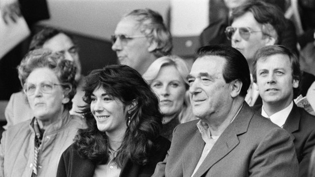 Robert Maxwell and his daughter Ghislaine watch a soccer match between Oxford United - which Robert Maxwell owned - and Brighton & Hove Albion  in 1984.