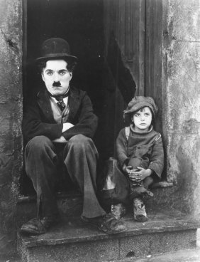 Charlie Chaplin and Jackie Coogan in his 1921 film The Kid.