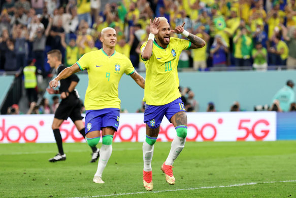 Neymar celebrates his 76th goal for the Selecao.