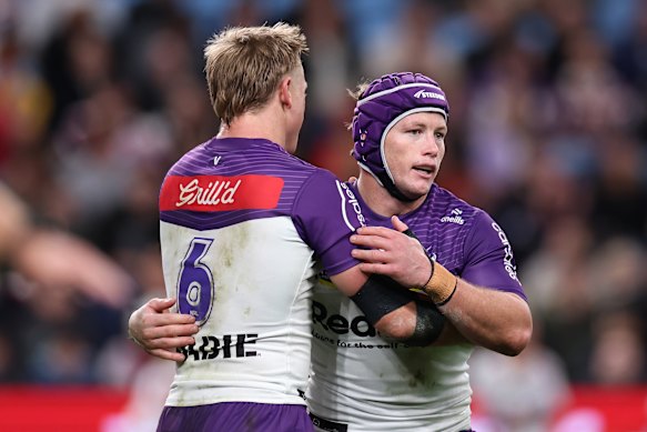 Harry Grant of the Storm celebrates scoring a try with Tyran Wishart.