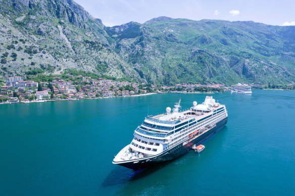 An Azamara cruise ship sailing into Kotor Bay.