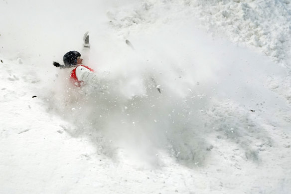 Laura Peel falls during the women’s aerials finals at the 2022 Winter Olympics.