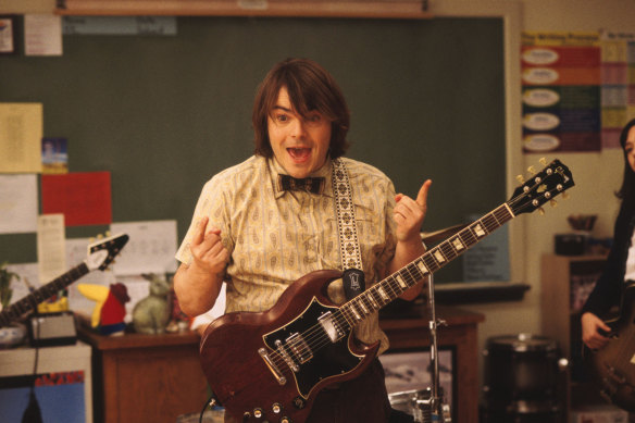 Jack Black in a scene from the movie School of Rock, which the musical is based on.