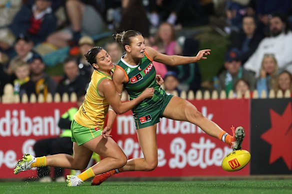 Libby Birch tackles Aine McDonagh.
