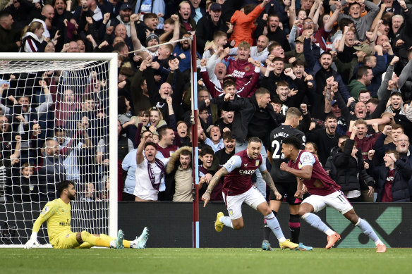 Aston Villa’s Ollie Watkins, right, and Danny Ings celebrate their side’s fourth goal against Brentford.