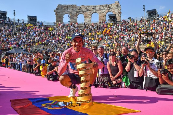 Ecuador's Richard Carapaz celebrates his Giro d'Italia victory in 2019. The new cycling calendar for 2020 has the Giro and the Vuelta a Espana overlap.