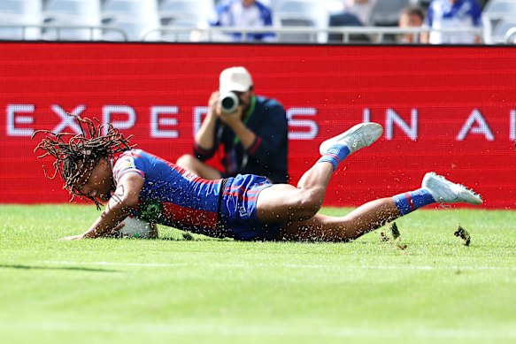 Dominic Young scores his first try of the afternoon.