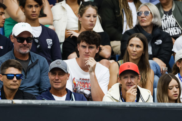 Lleyton (front row, second from left) and Bec Hewitt (middle third from left) support their son Cruz on Sunday, along with coach Peter Luczak (front left) and Jaymon Crabb (back left).