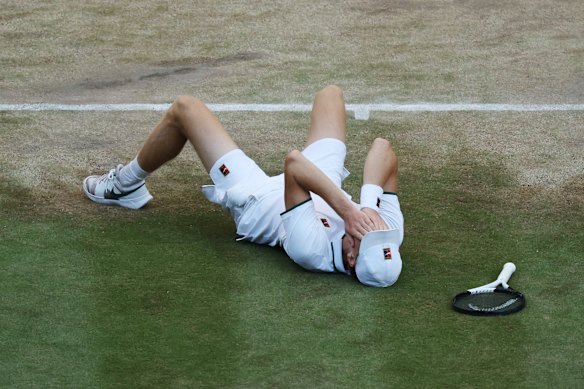 Jannik Sinner fell to the ground after claiming the title once again.