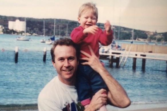 Sydney-born author Melanie Price pictured with her father Geoff Price at Forty Baskets Beach, Manly in the 1990s.