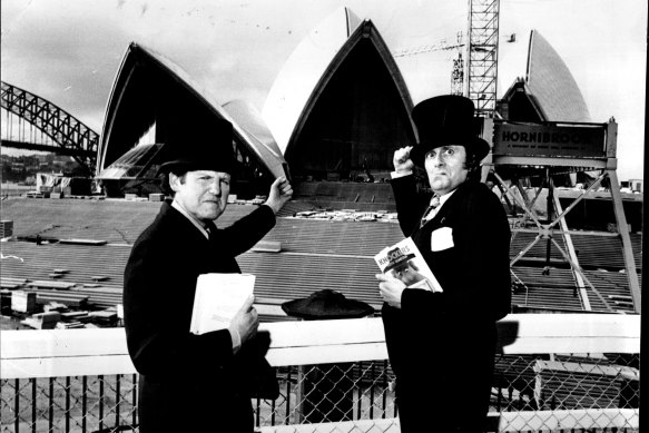 Keith Dunstan and Barry Humphries outside Opera House in 1972