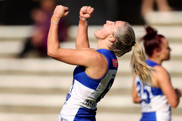 Alice O’Loughlin of the Kangaroos  celebrates a goal.