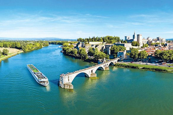 Avignon’s truncated Saint-Bénézet Bridge and medieval walls.
