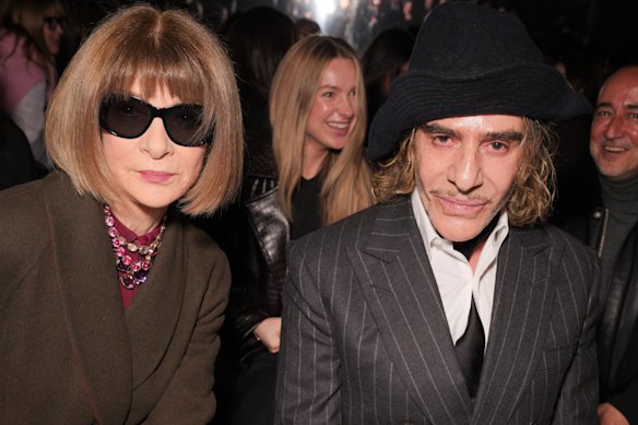 John Galliano has taken the unprecedented step of withdrawing from a planned exhibition in his honour at the Metropolitan Museum of Art. What does this mean for Met Gala tsar Anna Wintour? The duo is pictured here in January 2025 in Paris.