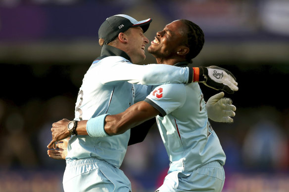 Jofra Archer (right) celebrates England's World Cup win with Jos Buttler.