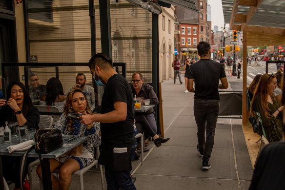 A cafe in New York, where restaurants are among the many businesses around the world grappling with labour shortages. 