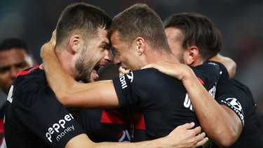 Face-off: Brendan Hamill, left, celebrates with Oriol Riera after the Spaniards first goal. 