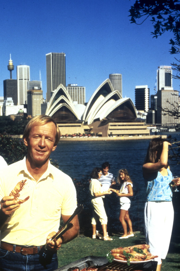Paul Hogan with a prawn in the 1984 Tourism Australia campaign “Come and say G’day”. 