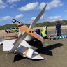 Passenger killed, pilot injured in plane crash on Queensland beach