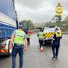 Border force officer targeting unlawful freight drivers during a nationwide crackdown.