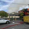 Man rushed to hospital after house fire in Brisbane’s inner north