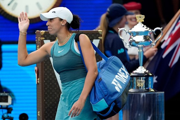 Madison Keys, of the United States, waves as she walks onto Rod Laver Arena in the women’s singles final.