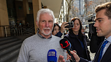Mick Malthouse leaves Melbourne Magistrates’ Court after providing evidence on Monday.