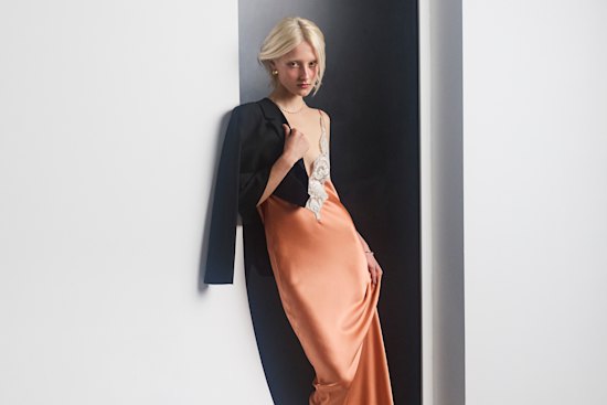 Maje blazer, $615. Sir “Danseurs” dress, $540. Christopher Esber shoes, $1395.
Celine by Hedi Slimane
“Abstraites” earrings, $930 (worn throughout). Sarah & Sebastian
“Corridor” necklace, $25,000. Jordan Askill “Shark” cuff, $31,689 (worn throughout).