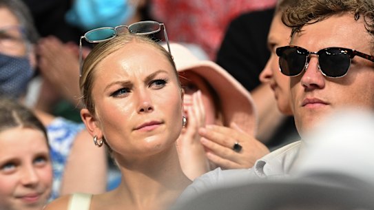 Grace Tame watching Dylan Alcott play in the Quad wheelchair singles final.