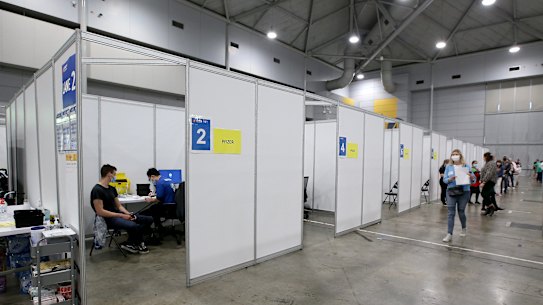 Vaccination hubs, like this one at the Brisbane Convention Centre, have been set up across the country to increase vaccination rates.