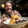 Bartender Manny Platsis with The Lincoln’s Hotels wild boar dim sims and beetroot relish.