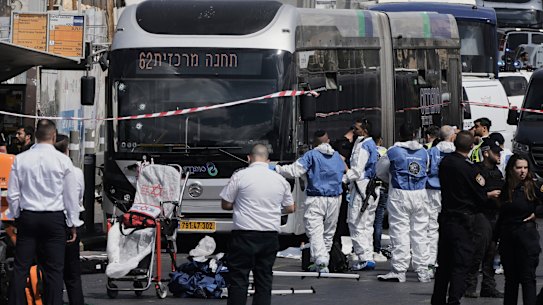 Israeli police and rescue teams respond to the scene of the shooting in Jerusalem.