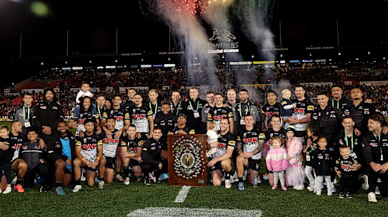 Panthers players and their families with the  JJ Giltinan Shield.