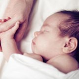 CREDIT: TRIBUNE Dec/31/2015 05:02 AM LIFE FAMILY -BIRTH DADS - ADOPTION TB 3000 x 2302 Color JPEG It wasn't until the 1970's, when Supreme Court decisions recognized birth fathers, that they earned the right to have a say in the adoption process. (Fotolia) Generic Baby holding father's hand Baby holding hands REVTRANSTEENS