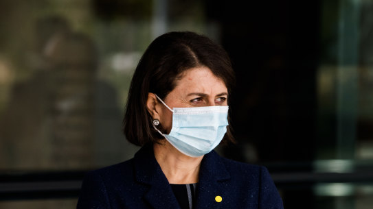 NSW Premier Gladys Berejiklian listens to Chief Health Officer Kerry Chant speak at a press conference on Thursday.