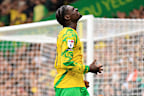 Toure reacts after missing a shot against Burnley