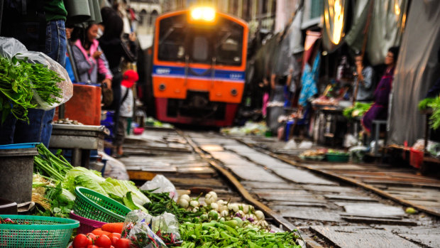 Thailand’s most unusual train ride is chaotic and surreal