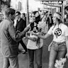 Peace, love and “flower power” was the mantra of the hippie generation: handing out daffodils to Kings Cross pedestrians in 1969.