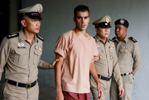 Thai prison officers escort Hakeem al-Araibi following an extradition hearing in Bangkok Criminal Court in February this year. A week later, he was released and flew back to Melbourne.