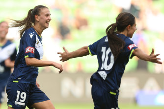Victory skipper Lia Privitelli (left) celebrates her goal with teammate Alex Chidiak in the first Melbourne derby A-League women’s finals match.