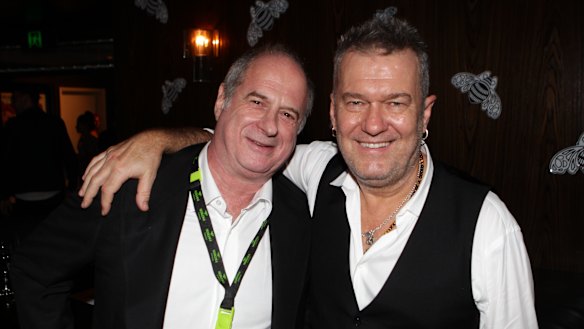 Michael Gudinski with Jimmy Barnes in Sydney in 2013. 