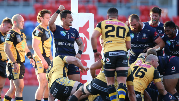 Rebels five-eighth Matt Toomua (centre) kicked a late conversion to seal a victory for his side against the Western Force. 