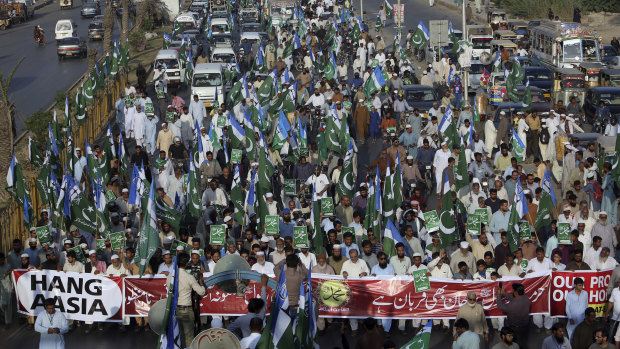 Supporters of Jamaat-i-Islami, a Pakistani Islamist party, participate in a rally in November to condemn the decision that acquitted Asia Bibi. 