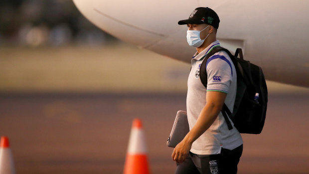 NZ Warriors captain Roger Tuivasa-Sheck walks across the tarmac after arriving in Tamworth as his club helped save the NRL season.